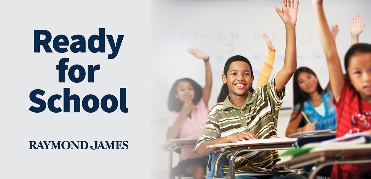 Students raise hands in classroom. Ready for School text shows at top of image.